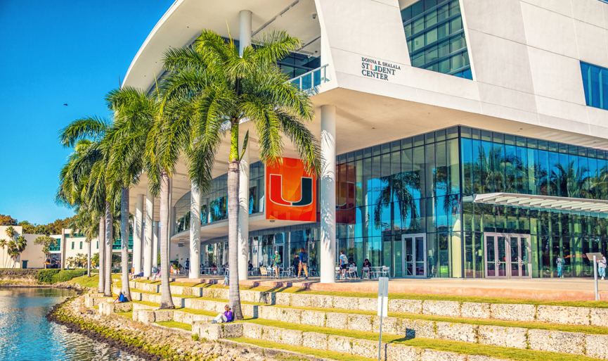 Student center at University of Miami with palm trees out front